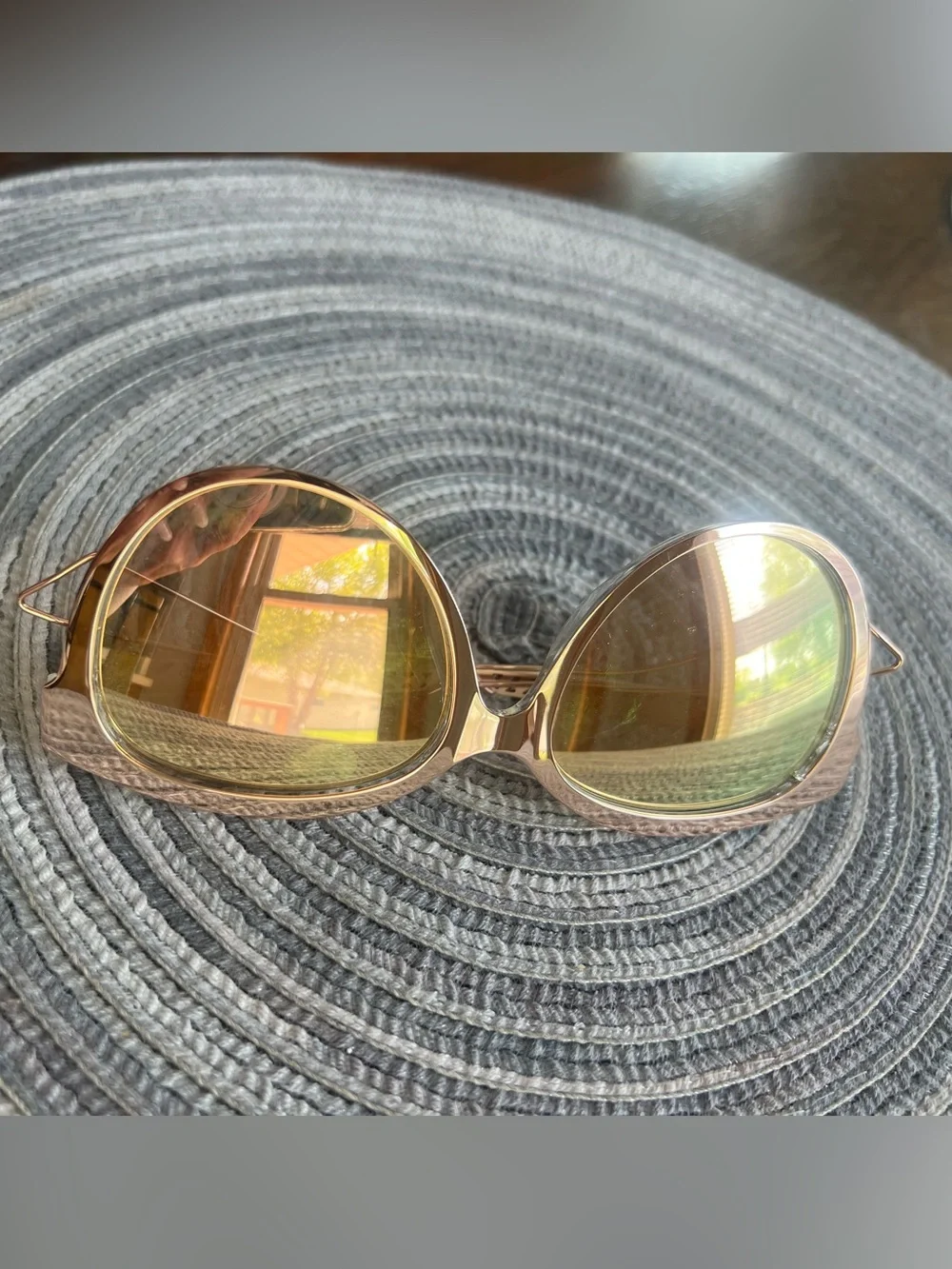 Dior Rose Gold Mirrored Cat-Eye Sunglasses. Elevate your sophisticated style